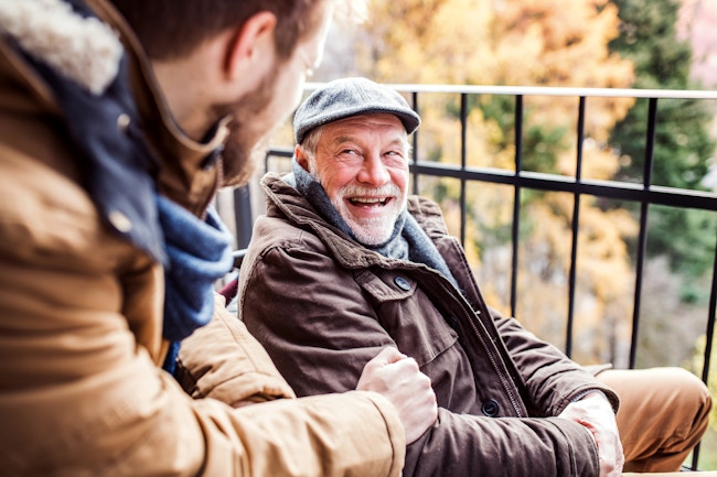 Volunteer_elderlyman_wheelchair_walk